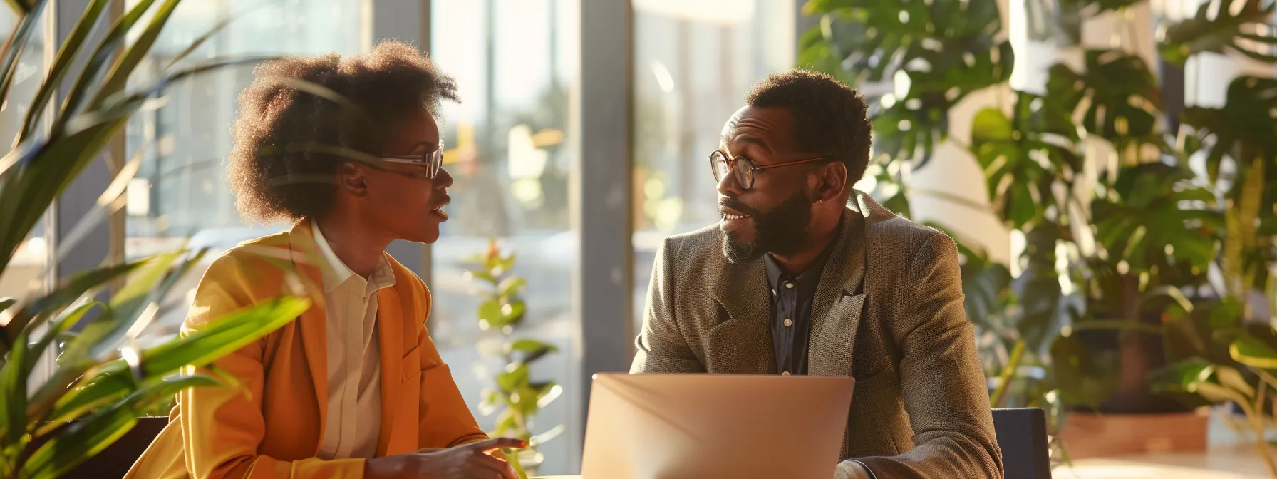 two professionals discussing licensing requirements and educational differences in a bright office setting.